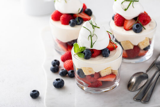 Berry pound cake trifle with cream cheese mousse and whipped cream