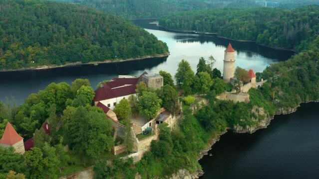 Fly over Zvikov Castle on the hill surrounded by river Vltava and Otava in South Bohemia region in Czech Republic.