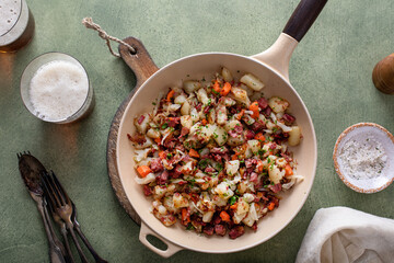 Corned beef hash with potatoes, cabbage and carrot - obrazy, fototapety, plakaty