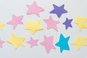 wobbly paper star shapes on blank paper