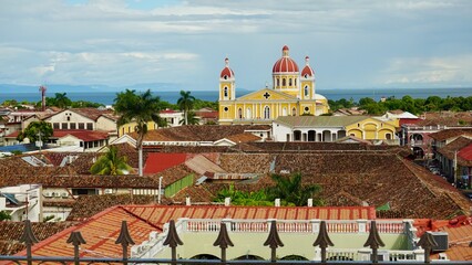 View of the historic center of Granada, Nicaragua. The most characteristic, outstanding building is the Immaculate Conception of Mary Cathedral Church, one of the city's symbols. 
