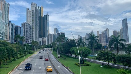 One of the main arteries of downtown Panama City, lying in between impressive skyscrapers.