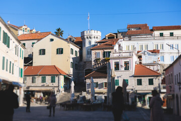 Fototapeta na wymiar Herceg Novi town, Kotor bay, streets of Herzeg Novi, Montenegro, with old town scenery, church, Forte Mare fortress, Adriatic sea coast in a sunny day