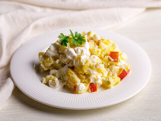 Homemade Potato salad with apple and cheese on white plate. Healthy diet food