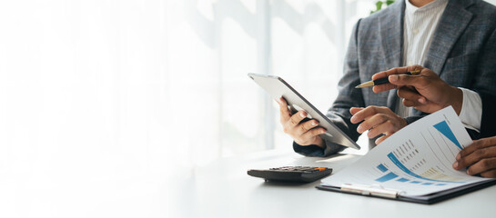 Cropped shot of hardworking business people explaining the concept of the project to his coworker before the meeting begins.