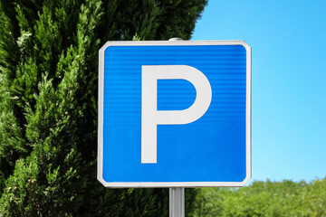 Parking road sign outdoors on sunny day