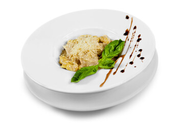 Delicious meat with green basilic in white plate