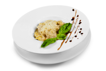 Delicious meat with green basilic in white plate