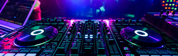 professional DJ music mixer at a party at an electronic music concert - obrazy, fototapety, plakaty