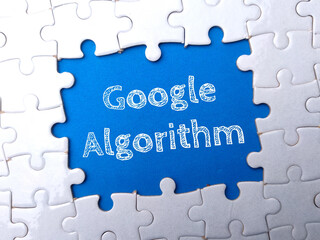White puzzle with the word Google Alorithm.
