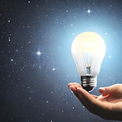 Close up of human hand holding light bulb on dark blue sky background