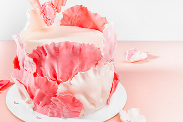 Girlish birthday cake. Pink dessert with mastic leaves shape. Cake for women.People doing activities
