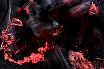 Red black abstract ocean background. Splashes and waves of paint under water, clouds of smoke in...
