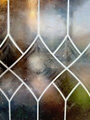 close up of antique window with reflections in glass vintage background  - 568284963