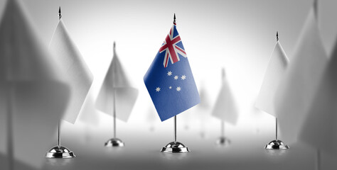 The national flag of the Australia surrounded by white flags