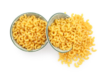 Bowls of raw elbow pasta on white background