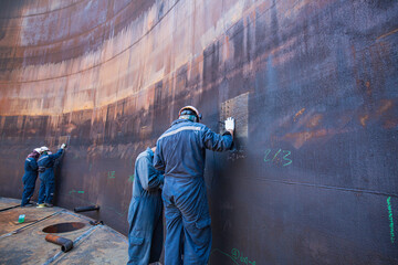 Male worker inspection  ultrasonic thickness corrosion shell plate