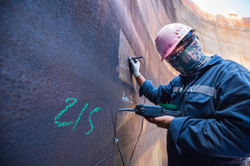 Male worker inspection  ultrasonic thickness corrosion shell plate