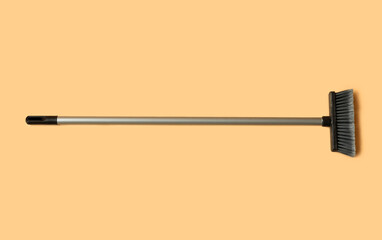 Broom for cleaning on color background