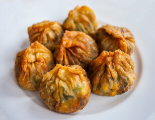 Jiaozi or Kuo Tie are traditional Chinese dumplings commonly eaten in China and other parts of East Asia. This one come from street vendor in Bandung, Indonesia.