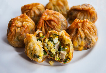 Jiaozi or Kuo Tie are traditional Chinese dumplings commonly eaten in China and other parts of East Asia. This one come from street vendor in Bandung, Indonesia.