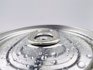 Close up Lid soft drink cans and drops of water.