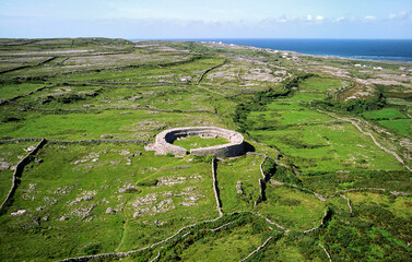 Dun Eoghanachta Bronze Age stone fort cashel in the limestone landscape of Inishmore, largest of...