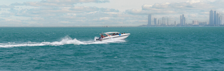 Sea trips on speedboat. Tourist boats in sea, Koh Lan Pattaya Thailand. Speedboats are available for tourists to rent for snorkeling and diving trips.