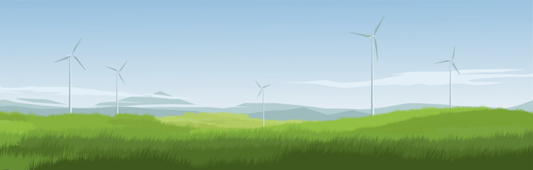 Countryside meadow panoramic landscape with wind turbines