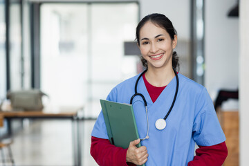 Portrait of professional doctor woman at hospital. Latin nurse, Smiling female doctor in lab coat.