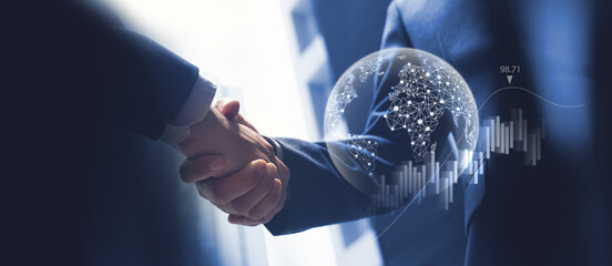 Global business, digital marketing, digital organization and teamwork concept. Successful business partner making handshake with financial graph growth and global internet network technology
