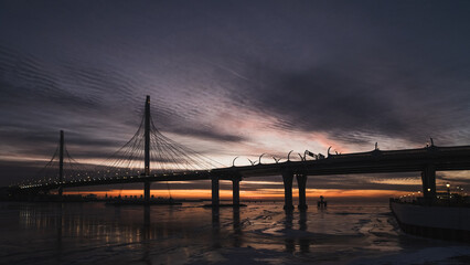 Fototapeta na wymiar Cable-stayed bridge in the evening at sunset