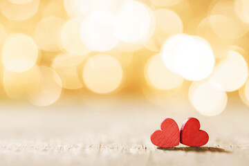 Two hearts on bokeh background - 568319710