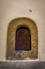 Wine window or buchetta del vino, used to sell wine in Florence, Tuscany, Italy