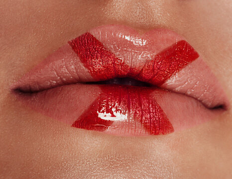 Closeup with female plump lips with christmas makeup.