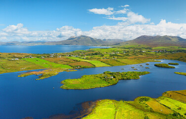 North east over Tully Lough to entrance to Killary Harbour and beyond to Mweelrea mountain. North...