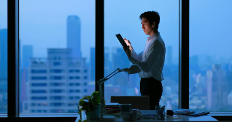 Business man uses tablet