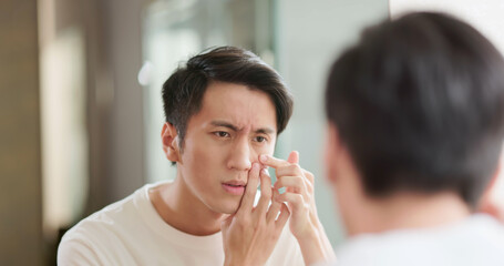 Asian man facial care