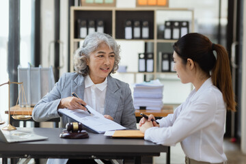 lawyer working on table office, law and justice concept, Selective focus, Law, Business people negotiating a contract, signing contract, problem consultant,