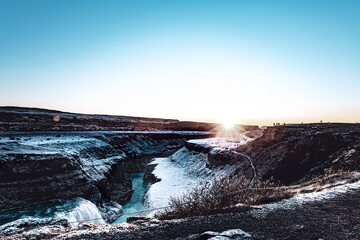 Iceland Gullfoss powerfull waterfall river in winter sunset or sunrise 