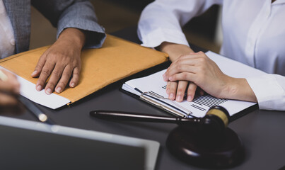 lawyer working on table office, law and justice concept, Selective focus, Law, Business people negotiating a contract, signing contract.