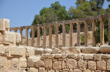 Sunny temples, arches, the Nymphaeum, stone ornaments, columns and column bases on the ruins of the...