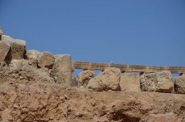 Sunny temples, arches, the Nymphaeum, stone ornaments, columns and column bases on the ruins of the...