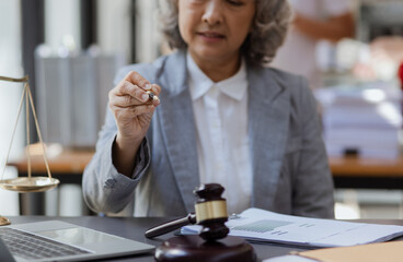 Manager executive or lawyer woman working on laptop in office desk.