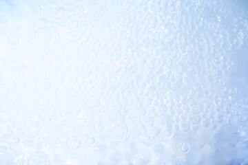 Blue water texture. Bubbles and bubbling water.