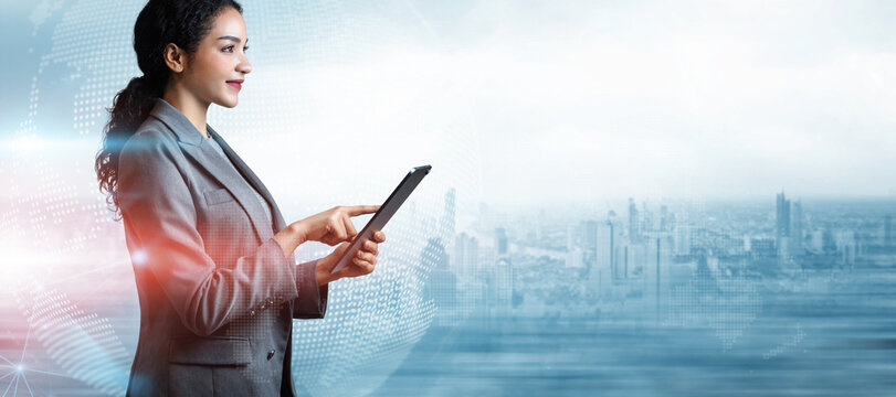 Businesswoman using tablet on world map city background with copy space, Business innovation technology digital concept, Double exposure of futuristic global network interface, Programming, IT support