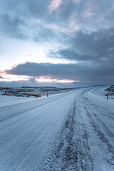 Iceland winter road mountain landscape with sunset