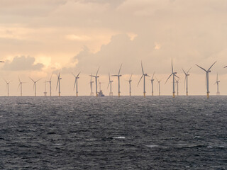 Offshore and Onshore Windmill farm Westermeerwind, Windmill park in the Netherlands with huge large wind turbines, group of windmills for renewable electric energy - obrazy, fototapety, plakaty