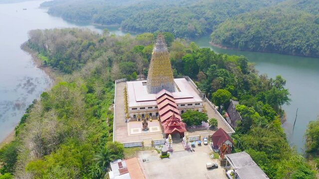 Phuthakaya Temple Pagoda, Sangklaburi Kanchanaburi Attractions. Singha in front of temple Bodhgaya Stupa.Thai architecture. Landmark