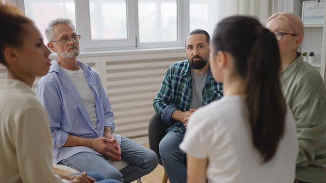 People with mental health issues listening to each other, sharing experience